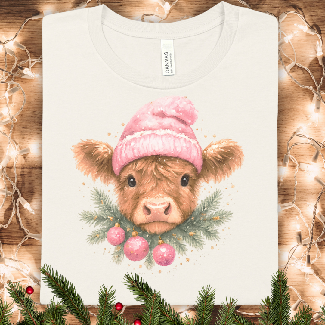 Cute Highland Cow Christmas Tee — Pink Beanie Cow with Ornaments