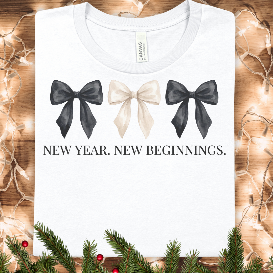 New Year, New Beginnings Tee — Ribbon Bow Graphic T‑Shirt