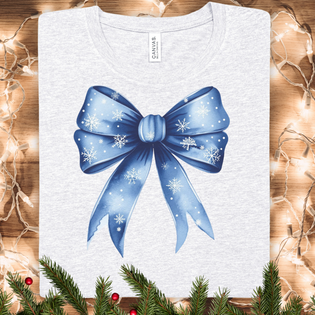Blue Coquette Snowflake Bow Tee — Holiday Gift Ribbon T-Shirt