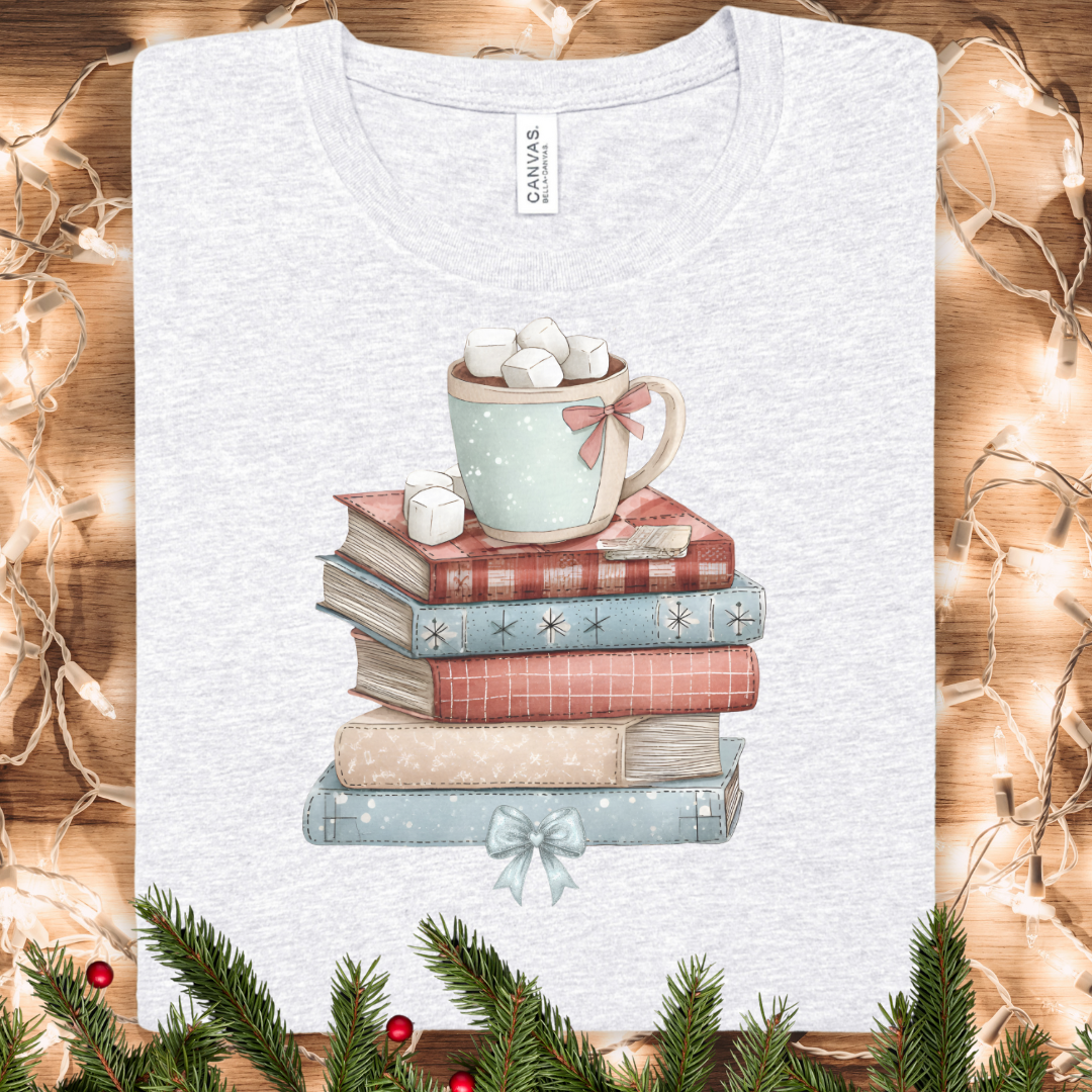 Cozy Books & Hot Cocoa Winter T‑Shirt — Cute Reading Stack Graphic Tee