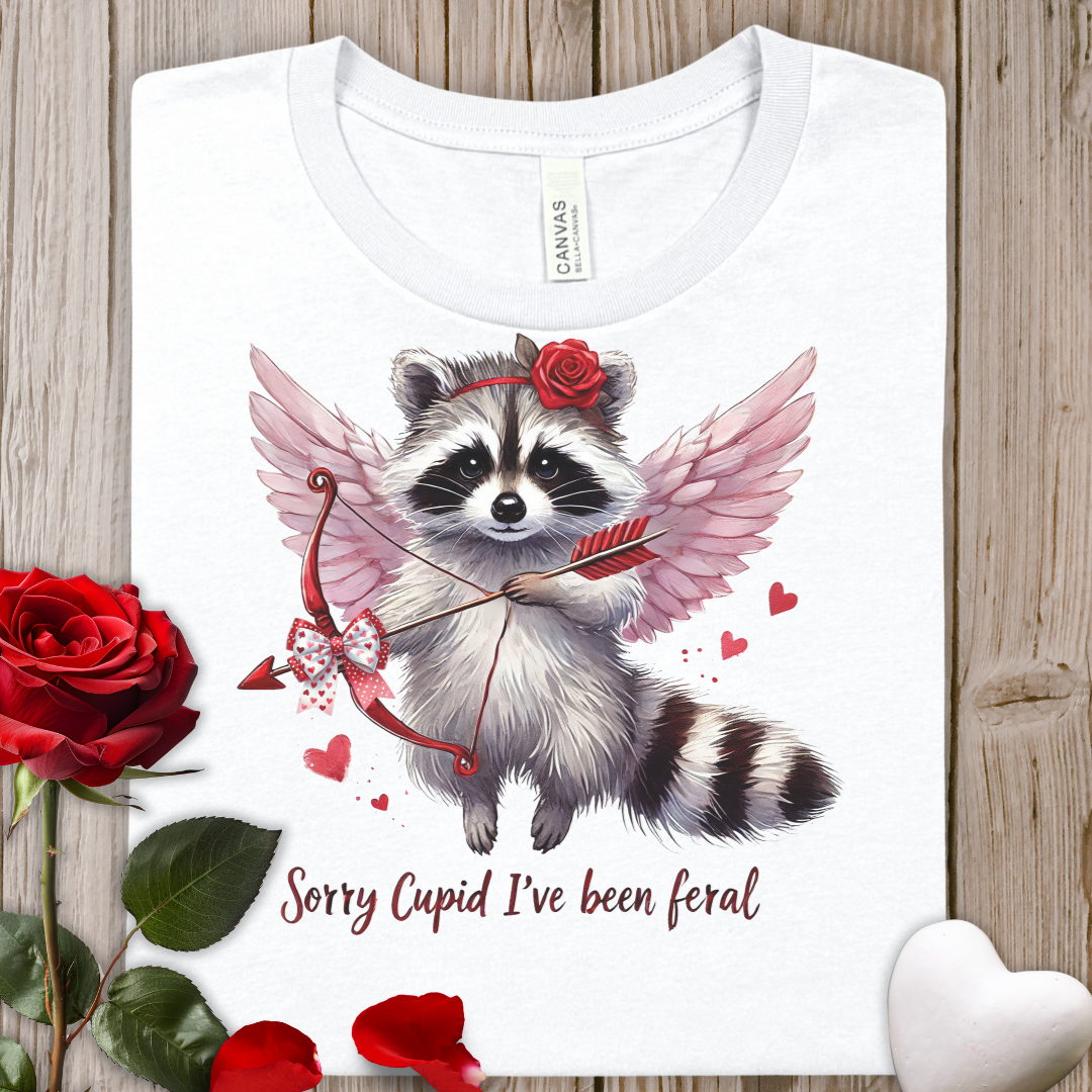 Cupid Raccoon Tee — "Sorry Cupid I've Been Feral" Cute Valentine Shirt