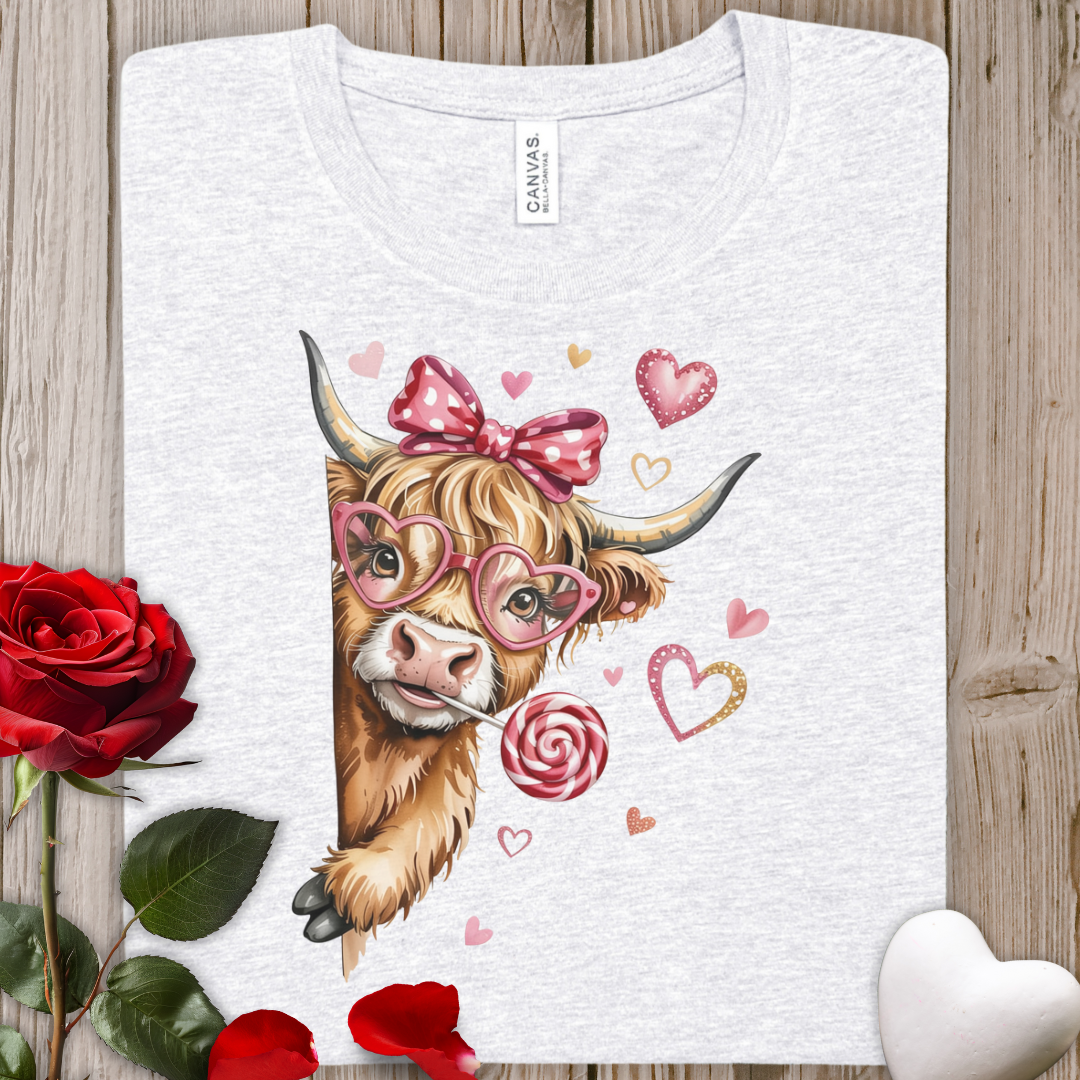 Highland Cow Valentine T-Shirt – Cute Cow with Heart Glasses & Candy Lollipop Tee