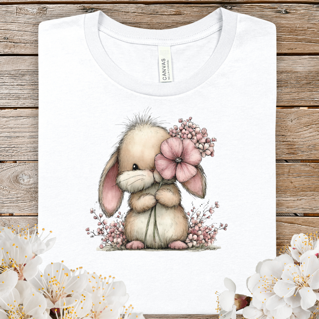 Cute Spring Bunny Holding Flower T‑Shirt — Adorable Floral Bunny Tee for Kids & Adults