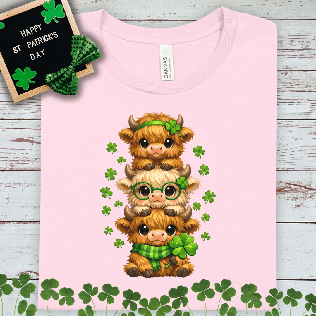 St. Patrick's Highland Cow Stack T-Shirt — Cute Shamrock Trio Tee