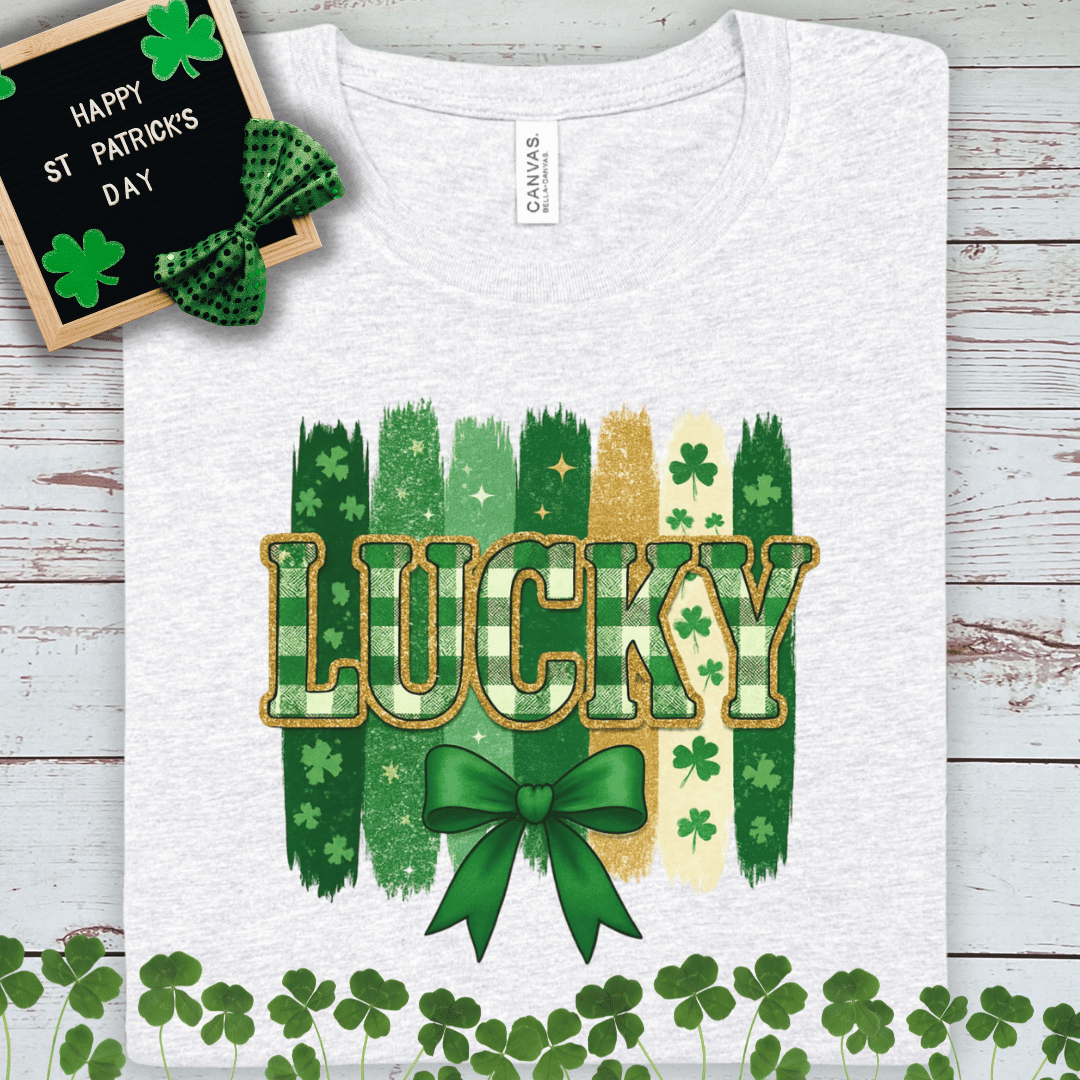 Lucky St. Patrick’s Day Tee — Green Shamrock Ribbon Graphic