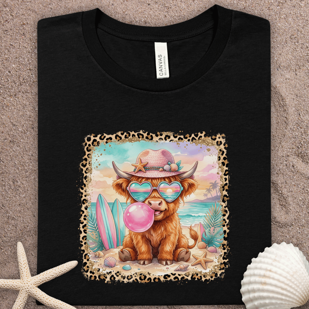 Highland Cow Beach T-Shirt - Surfing Cow with Sunglasses & Bubblegum Graphic Tee