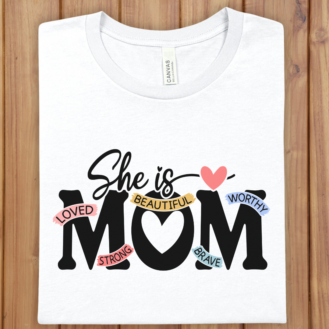 She Is Mom T‑Shirt — "She is MOM" Heart Design with Positive Words | Mother’s Day Gift